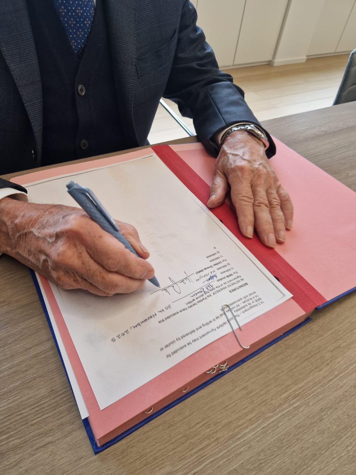 Unitec Group representative at signing ceremony